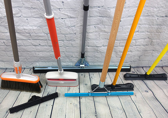 Soft-Bristled Broom or Vacuum Cleaner