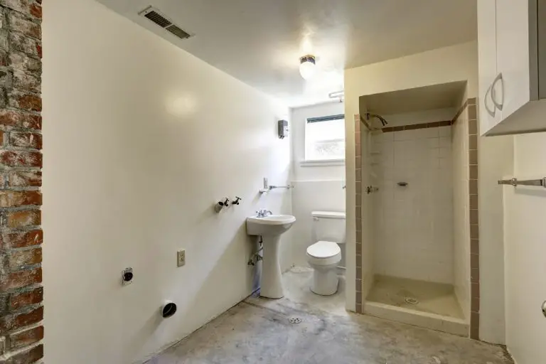 What are the challenges of putting a bathroom in a basement?