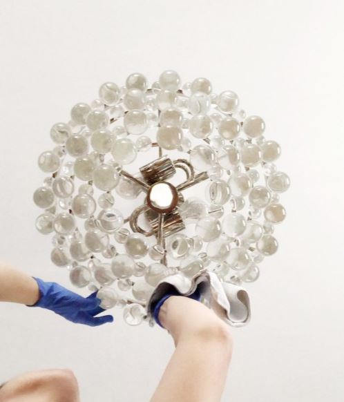 How do you clean a crystal chandelier without taking it down?