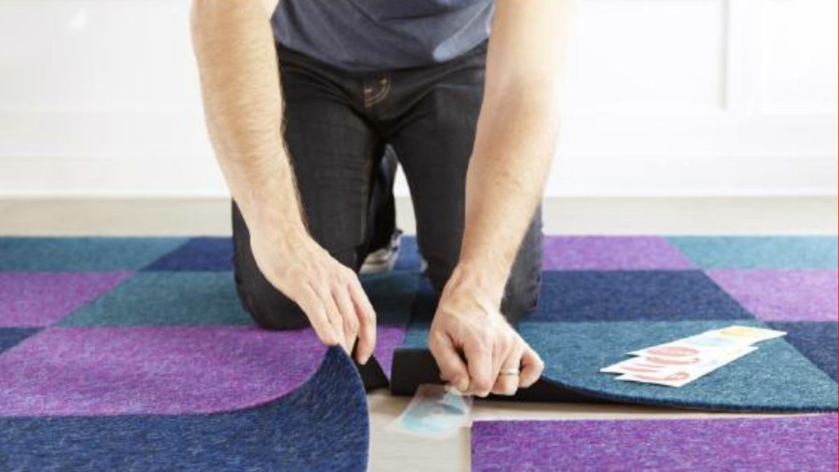 How do you attach carpet to tile