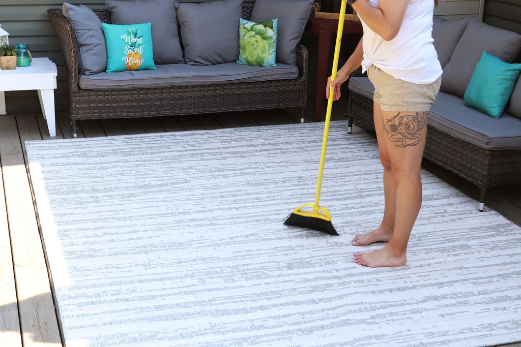 how-do-you-clean-outdoor-carpet-on-concrete