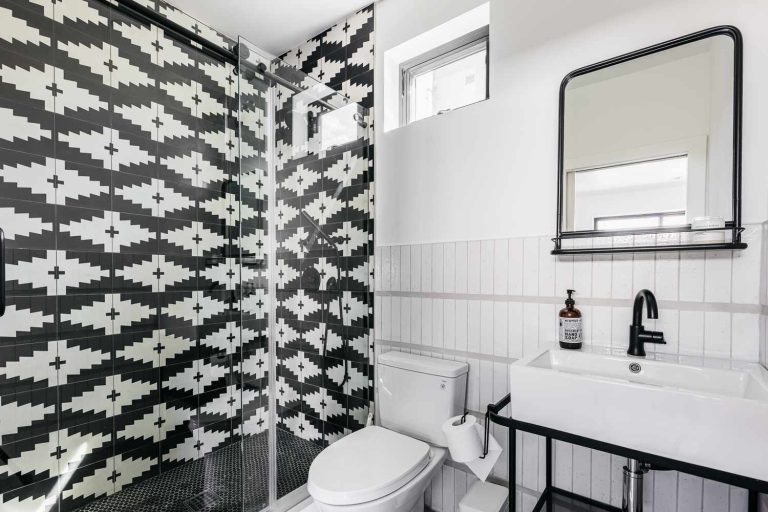 Small Glamorous Black And White Bathroom